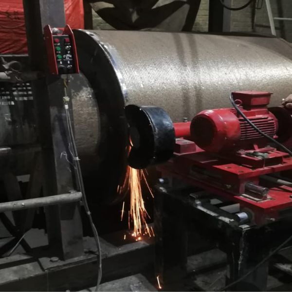 Auto-Grinding-Of-Roller-Press